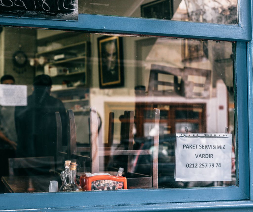 window of cafeteria offering food to go